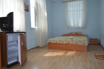 Фото номера Улучшенный двухместный номер с 1 кроватью Гостевой дом Guest house Azovets г. Бердянск 22