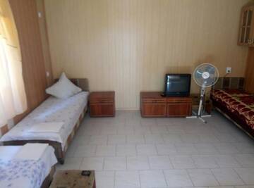 Фото номера Четырехместный номер с общей ванной комнатой Гостевой дом Guest House Gostinnyi г. Бердянск 7