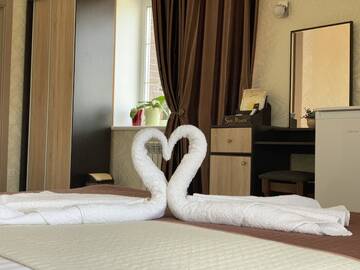 Фото номера Номер с кроватью размера «queen-size» и балконом Гостевой дом Sun House г. Бердянск 13