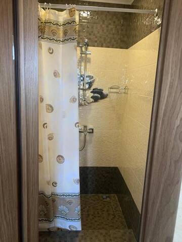 Фото номера Номер с кроватью размера «queen-size» и балконом Гостевой дом Sun House г. Бердянск 33