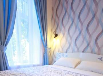 Фото номера Роскошный четырехместный номер Отель SLEEP TIME г. Бердянск 4