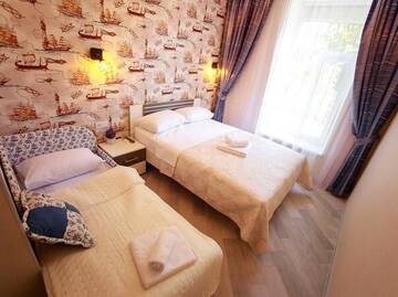 Фото номера Классический трехместный номер Отель SLEEP TIME г. Бердянск 7