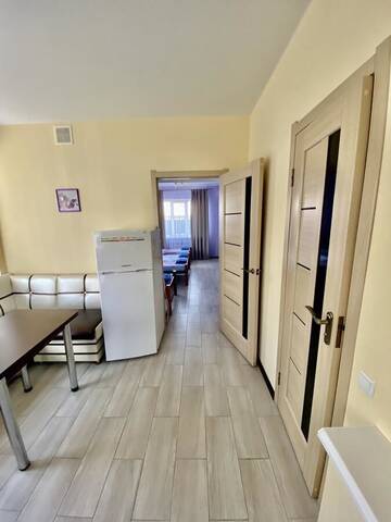 Фото номера Классический четырехместный номер Отель Holiday г. Бердянск 7