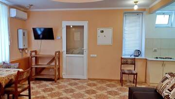 Фото номера Семейный полулюкс Гостевой дом ЦЕНТР - Center г. Бердянск 14