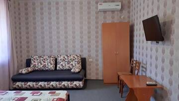 Фото номера Семейный полулюкс Гостевой дом ЦЕНТР - Center г. Бердянск 25