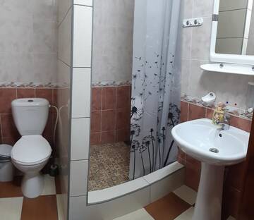Фото номера Двухместный номер с 1 кроватью и собственной ванной комнатой Апарт-отели Apart-hotel Ugolok г. Бердянск 7